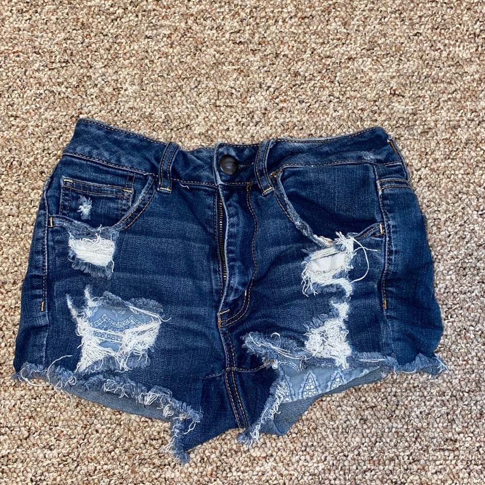 Distressed denim shorts